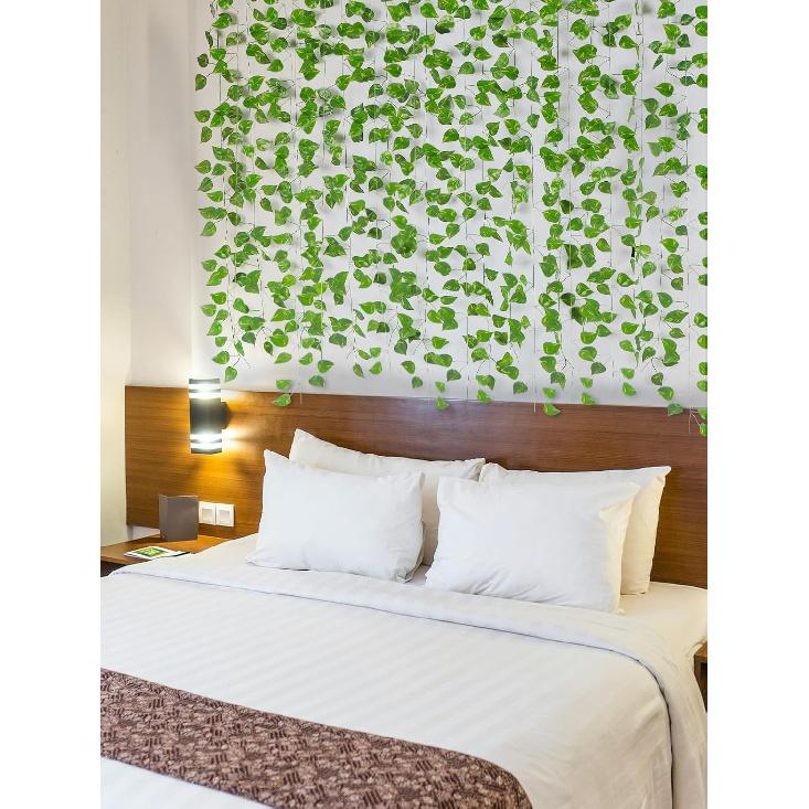 Kalolary 12 Pack Artificial Ivy Garlands, 88FT Scindapsus Leaf Fake Vines Plants Greenery Hanging Plants Vine Fake Plants for Wedding Bedroom