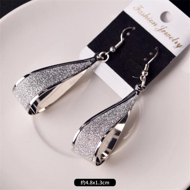 Fashion exaggerated niche temperament fringed earrings retro personality versatile sequined earrings women's long ear jewelry