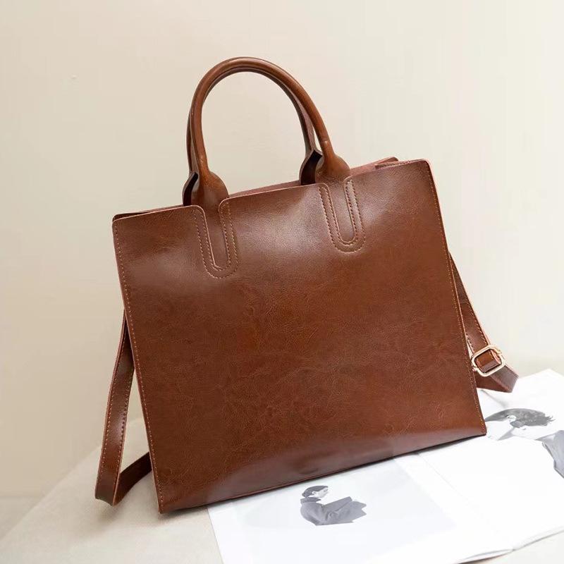 

Женская сумка из натуральной кожи 2025 Новая модная сумка-тоут Тренд Большая вместимость Простая универсальная сумка-тоут из коровьей кожи 32*28*14 коричневый