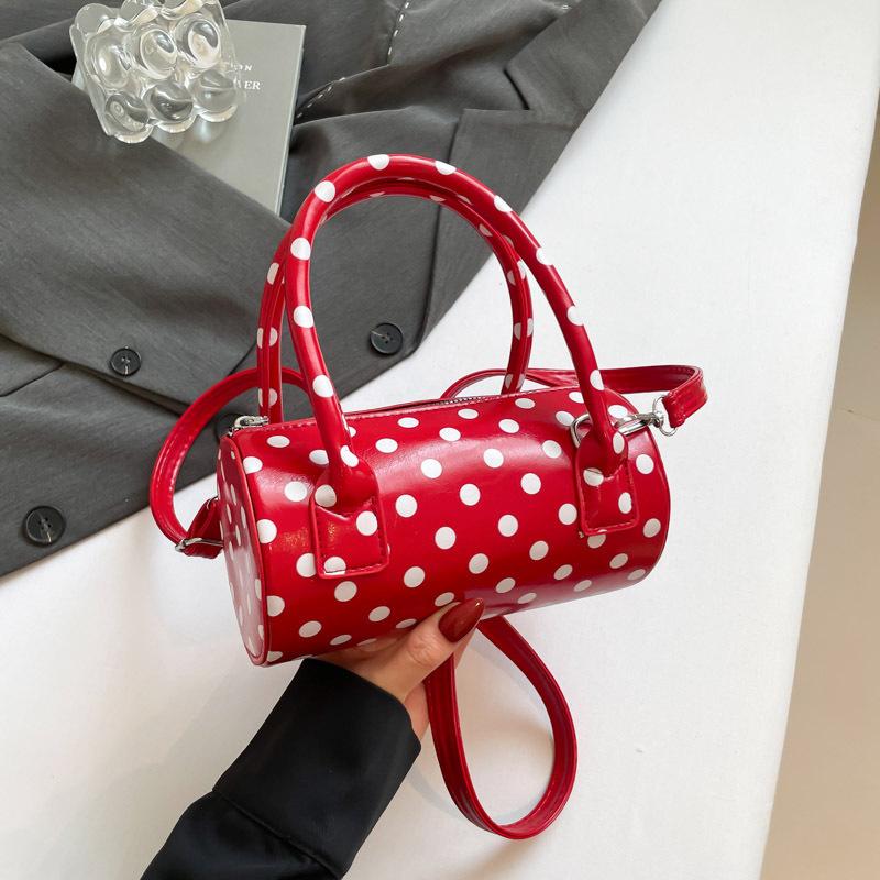 

Нишевая сумка в горошек женская 2025 новая модная универсальная сумка-мессенджер под мышкой изысканная портативная маленькая сумка цилиндрическая сумка красный