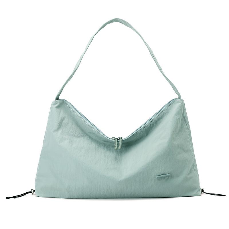 Korean style spring and summer new women's solid color high-end niche shoulder crossbody armpit bag