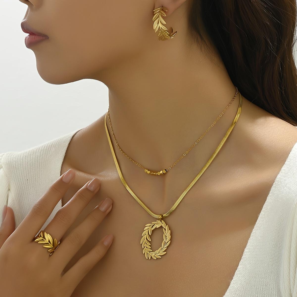 

Модный набор из титановой стали Perhiasan Daun Hitam Huang Lai Cai Xiao Kuadrat Ganda Rantai Kunci Anting Cincin Set золотой