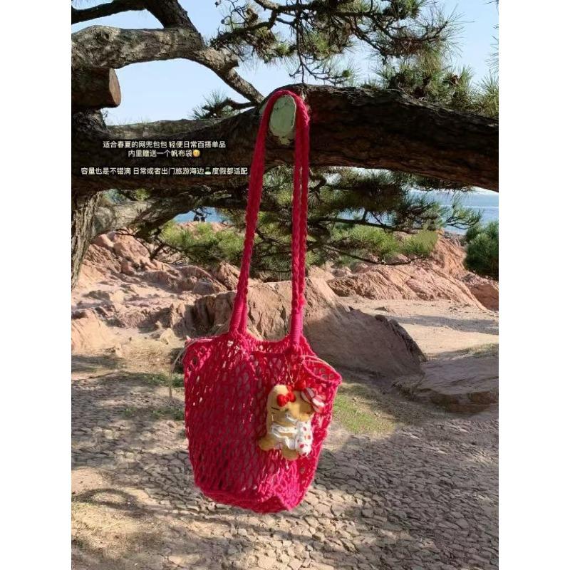 Sac de plage tissé creux design de niche d'été pour femmes nouveau sac à bandoulière en maille grande capacité