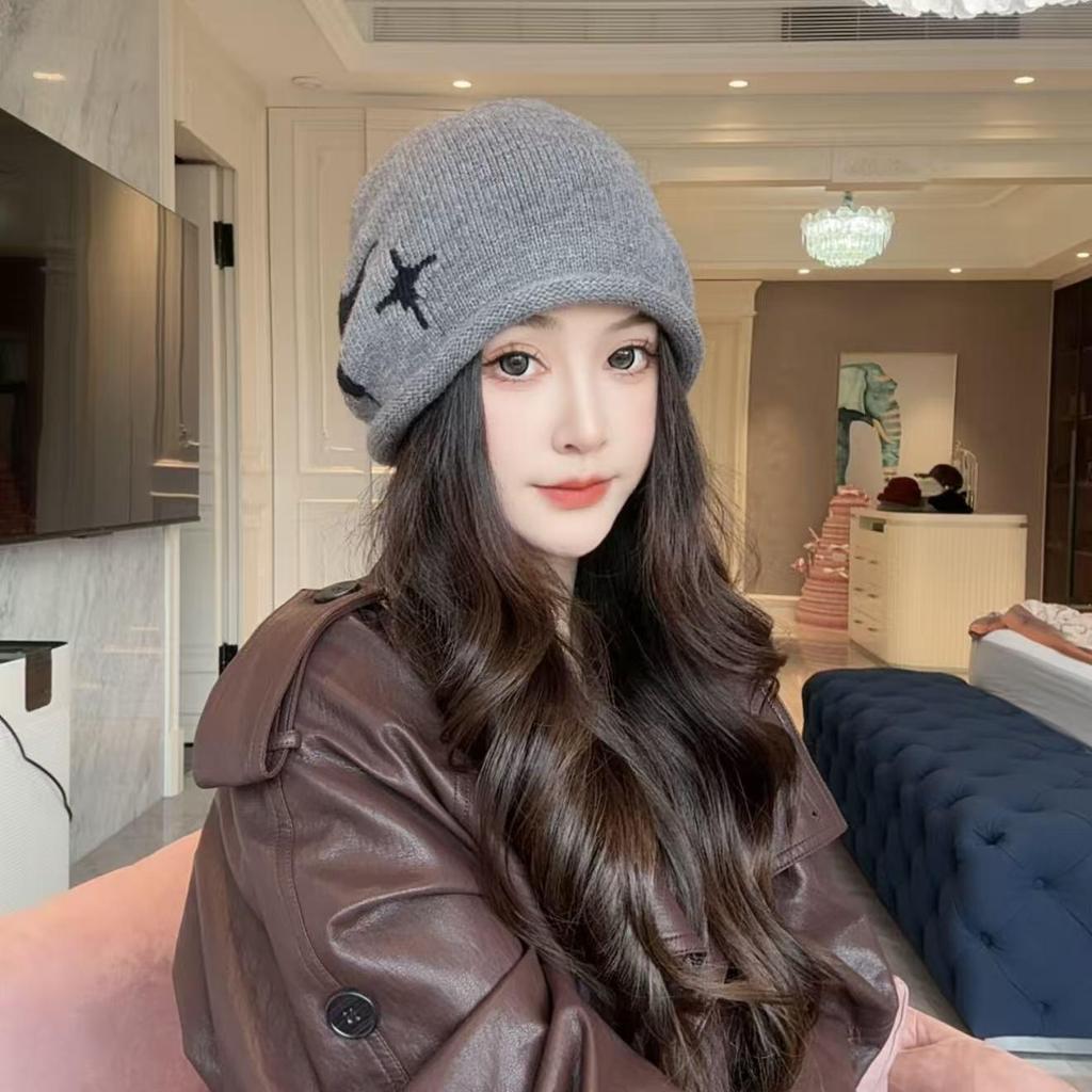 Stacking hat 2025 new crimping drawstring showing face small knitted autumn and winter warm ear protection hat women's cold hat Baotou hat