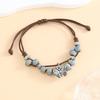 New retro literary and pastoral woven butterfly ceramic bracelet female student hand rope male