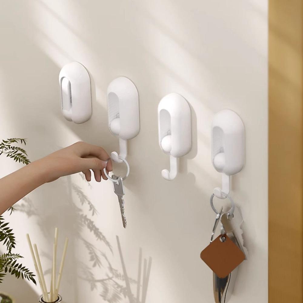 Household rotating hook, no punching and no marking adhesive hook