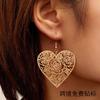 A Pair of Retro Simple and Fashionable Girly Heart Alloy Hollow Rose Love Earrings Are Suitable for Daily Leisure
