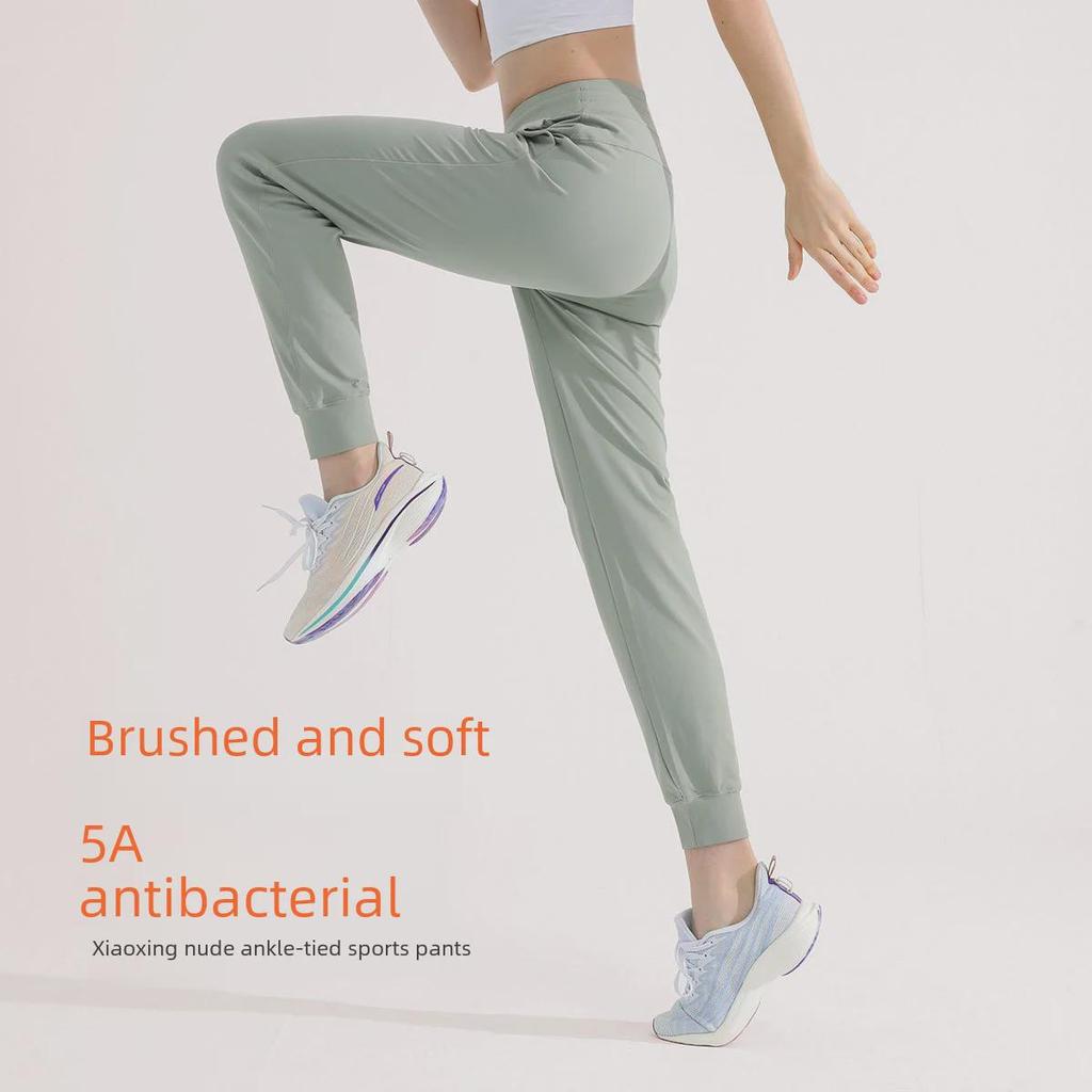 Women's Green Drawstring Quick-Dry Sports Pants: Lightweight, High-End, Straight-Leg Design for Summer.