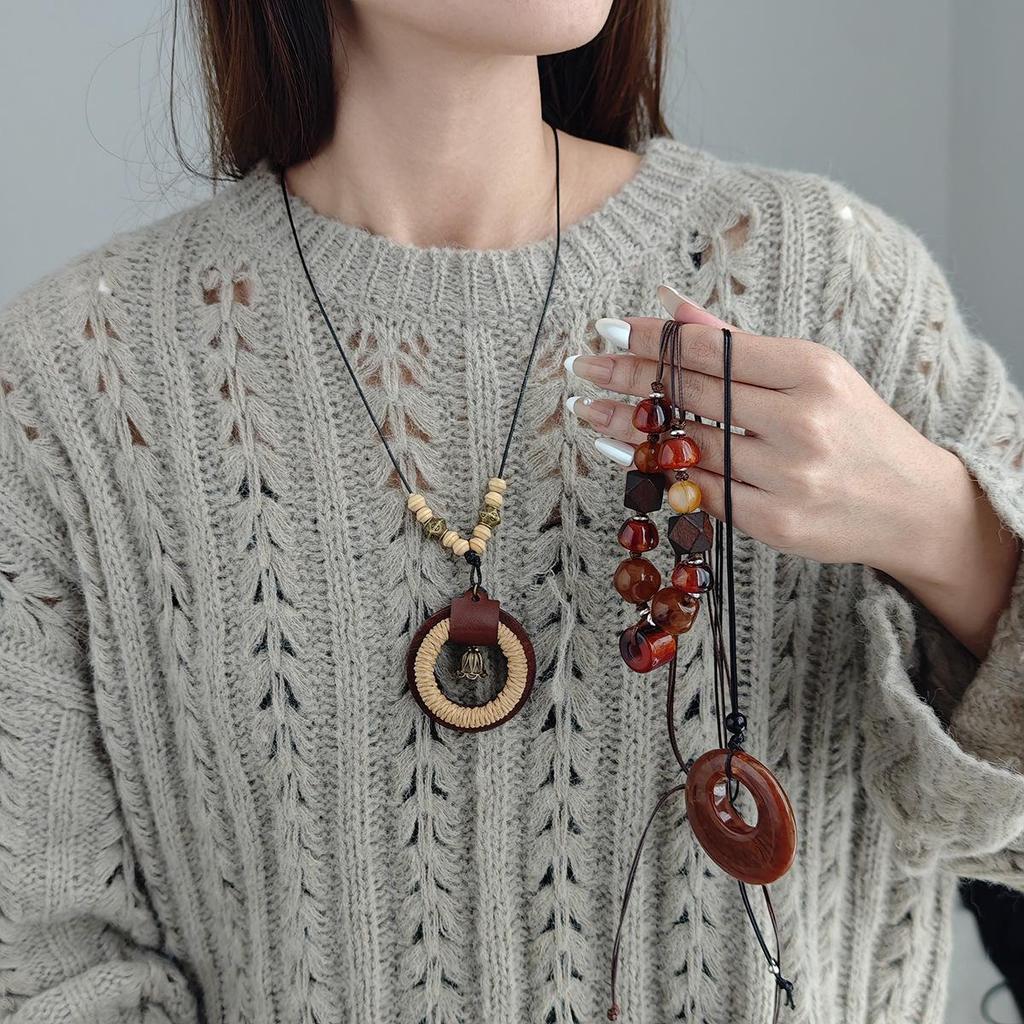 Antique Bronze Feather Necklace: Bohemian Double-Layer Zen Style for Women