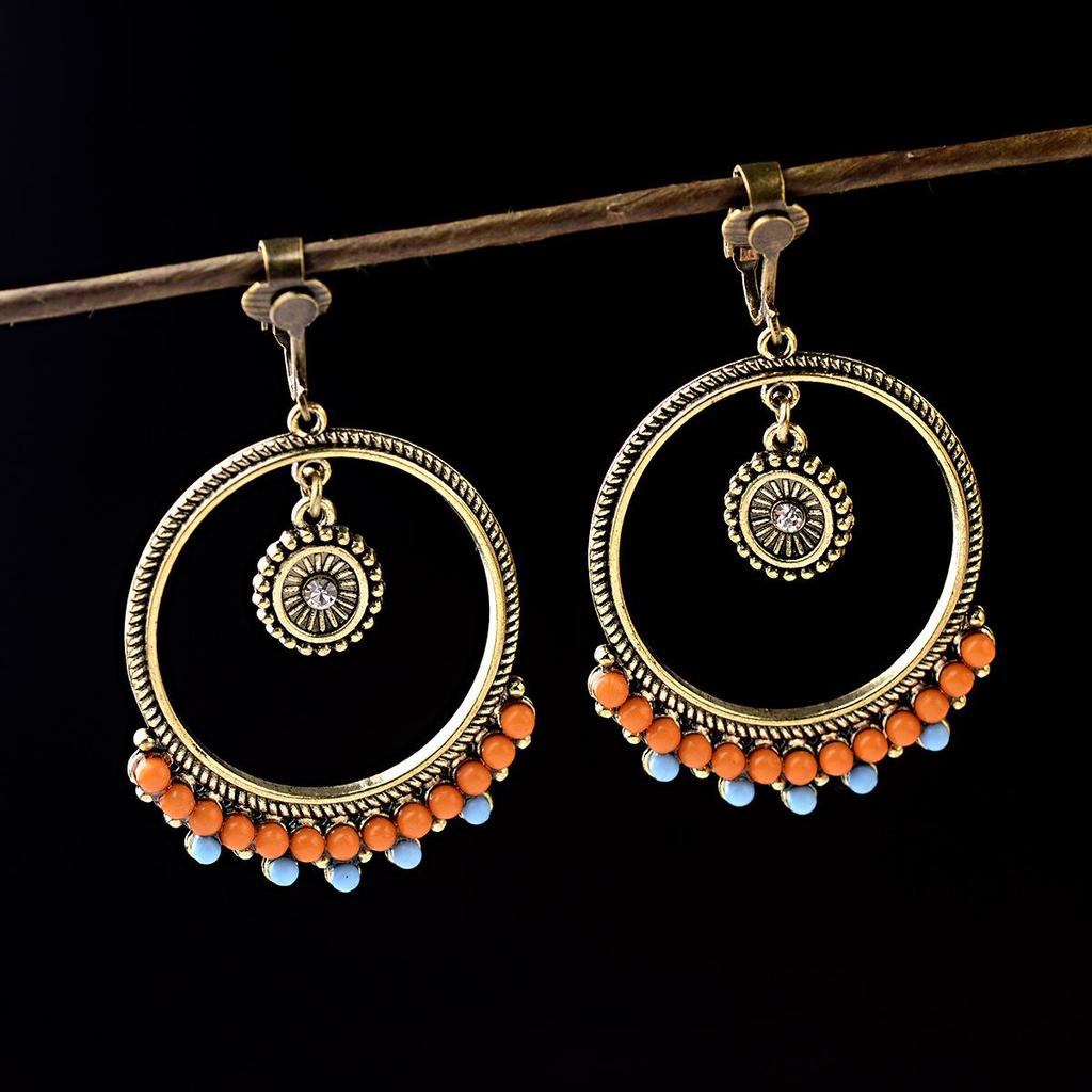 Yunnan Ethnic Bohemian Feather Earrings - Exaggerated No-Pierce Clips for Women