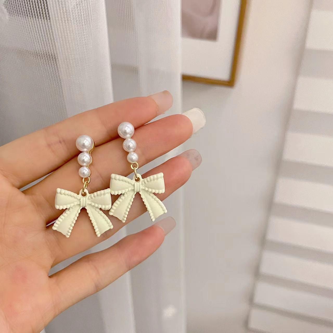 

Трендовые серьги-пусеты с жемчугом и бантом из серебра 925 пробы для женщин - Нишевый дизайн