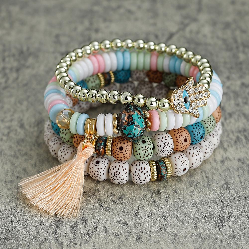 Bracelet bohème multicouches en perles avec pompon et motif palmier contre le mauvais œil pour homme et femme