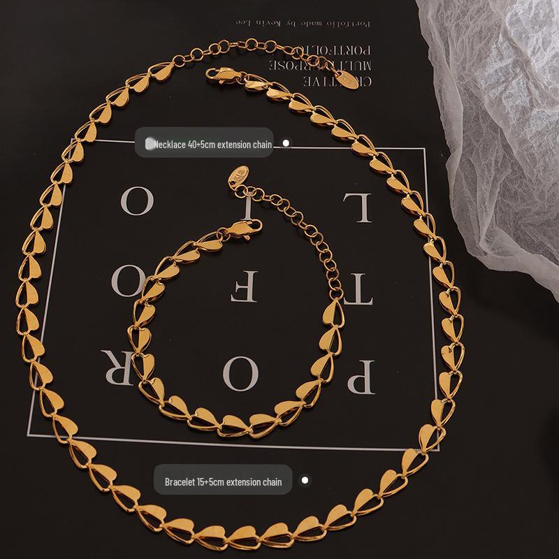 European & American Fashion Slim Waist Hollow Heart Necklace & Bracelet Set