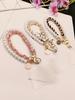 1Pc DY Leather Pearl Camellia Mobile Phone Charm Bracelet Chain Anti-lost Universal Cell Phone Strap Rope Pendant Metal Key