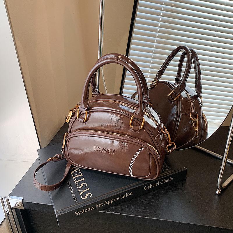 

Niche retro pillow bag women s new high-end sense versatile shoulder messenger bag hand carry commuter bag