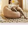 Cream Pumpkin Tatami Sofa Chair: Compact Single Person Sofa for Bedroom or Balcony Relaxation.
