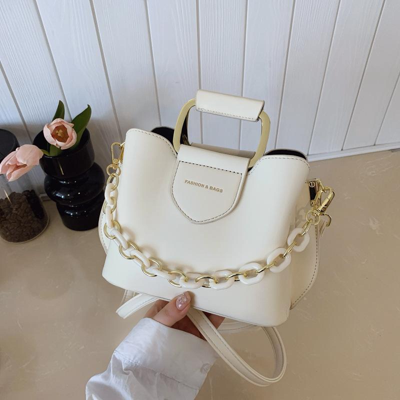 

Today s popular bags, new summer texture niche shoulder bags, versatile messenger bucket bags off білий колір