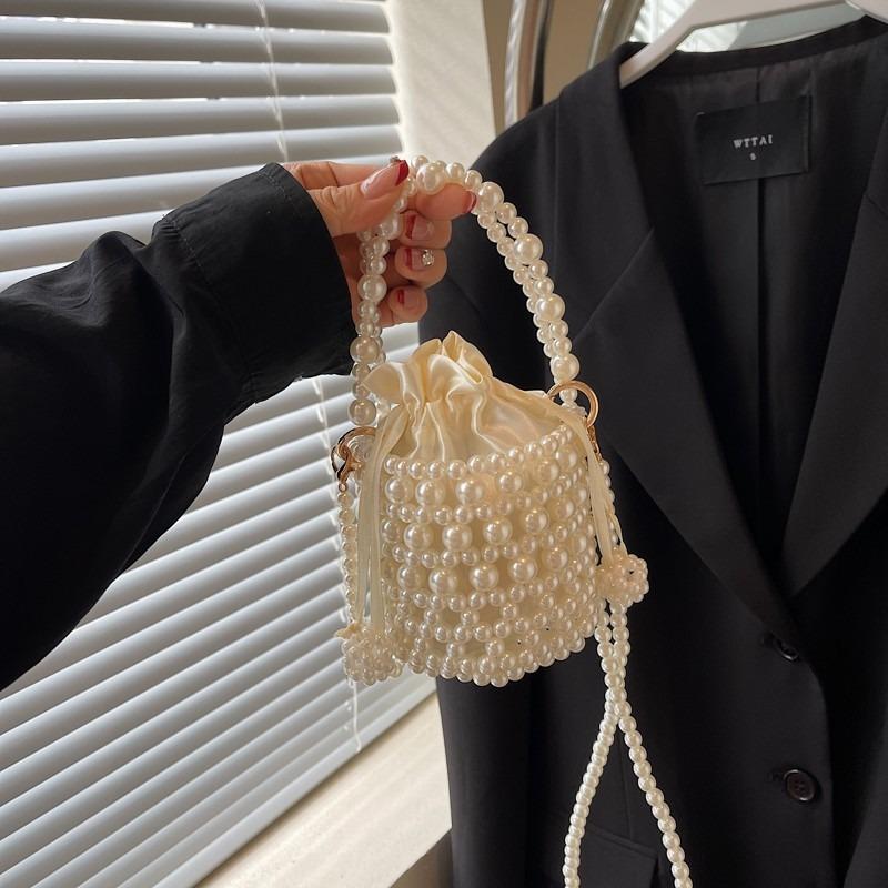 Modetrend lässige Textur einfache Bucket Bag Frühling und Sommer neu Nische Damen Schulter Umhängetasche