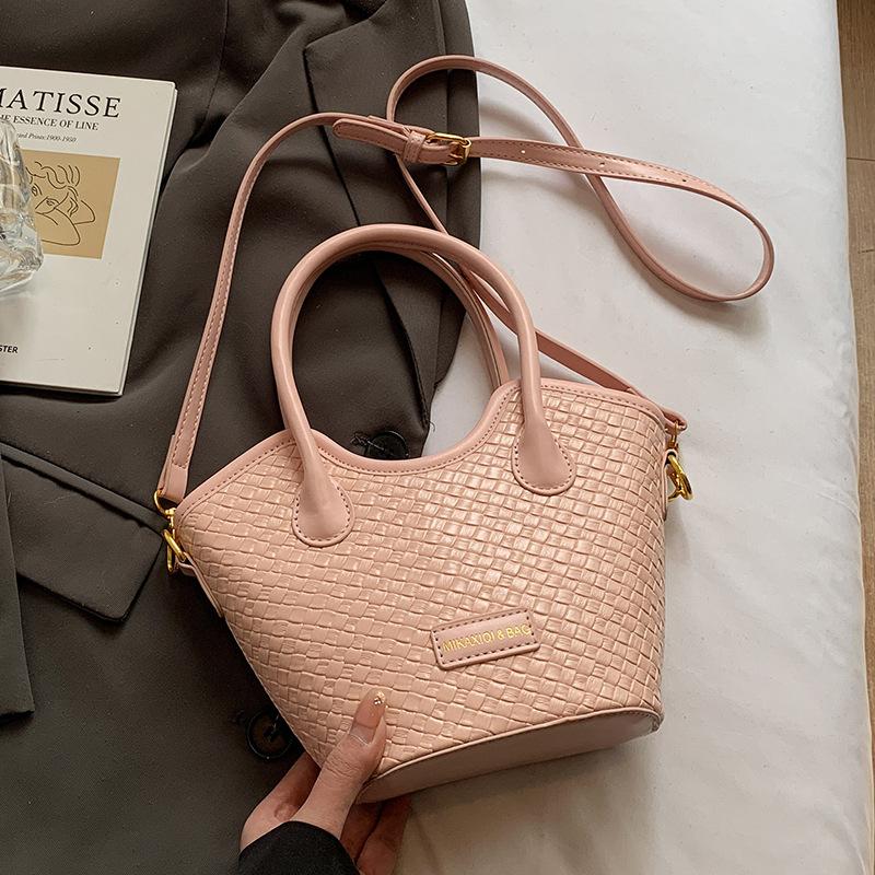 

This year s popular niche weaving sense solid color portable bucket bag women commute to work versatile simple shoulder messenger bag