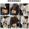 Spring new simple retro hand bucket bag women's shoulder bag high-end texture niche messenger bag