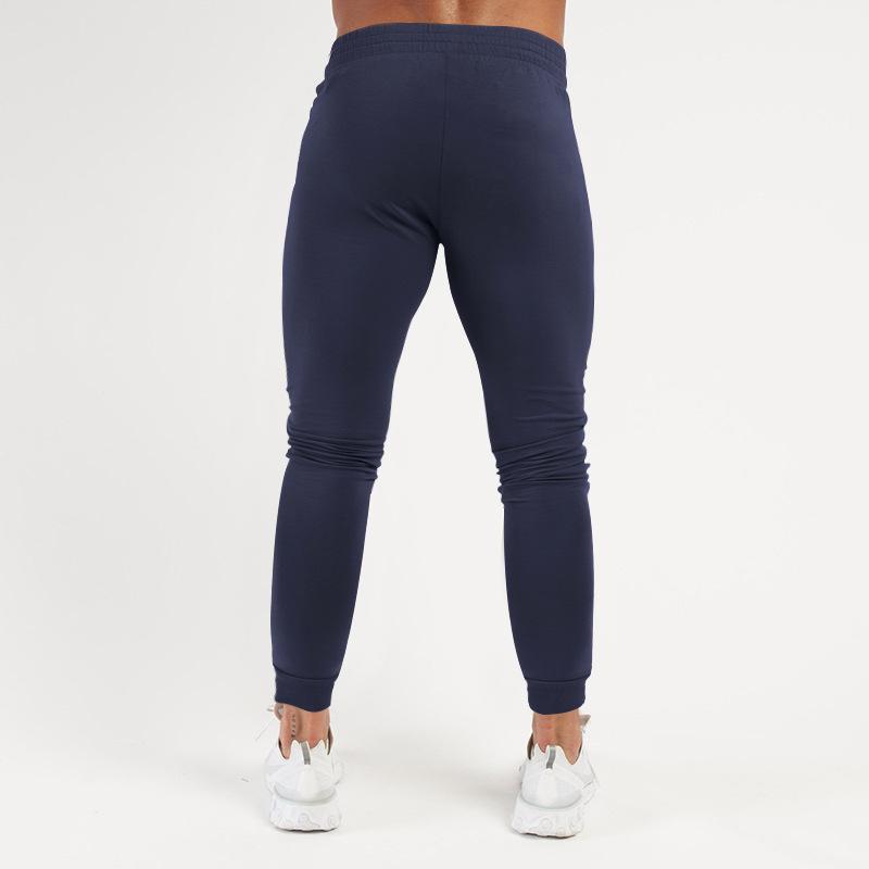 Frühling und Sommer Neue einfarbige Fitnesshose Lässige elastische Sporthose Herrenmode