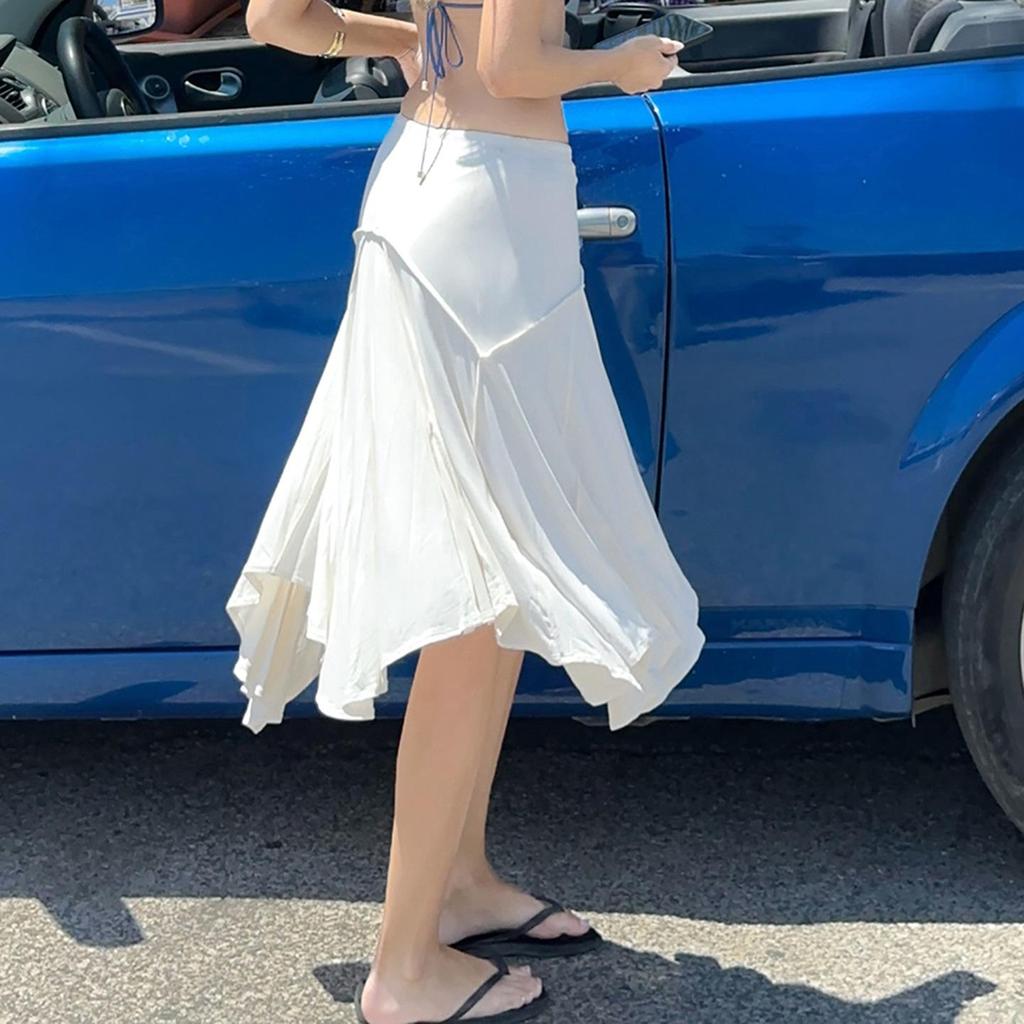 Elegant French White Irregular Half Skirt with Flowing Drape, Side Tie, and Low Waist Design