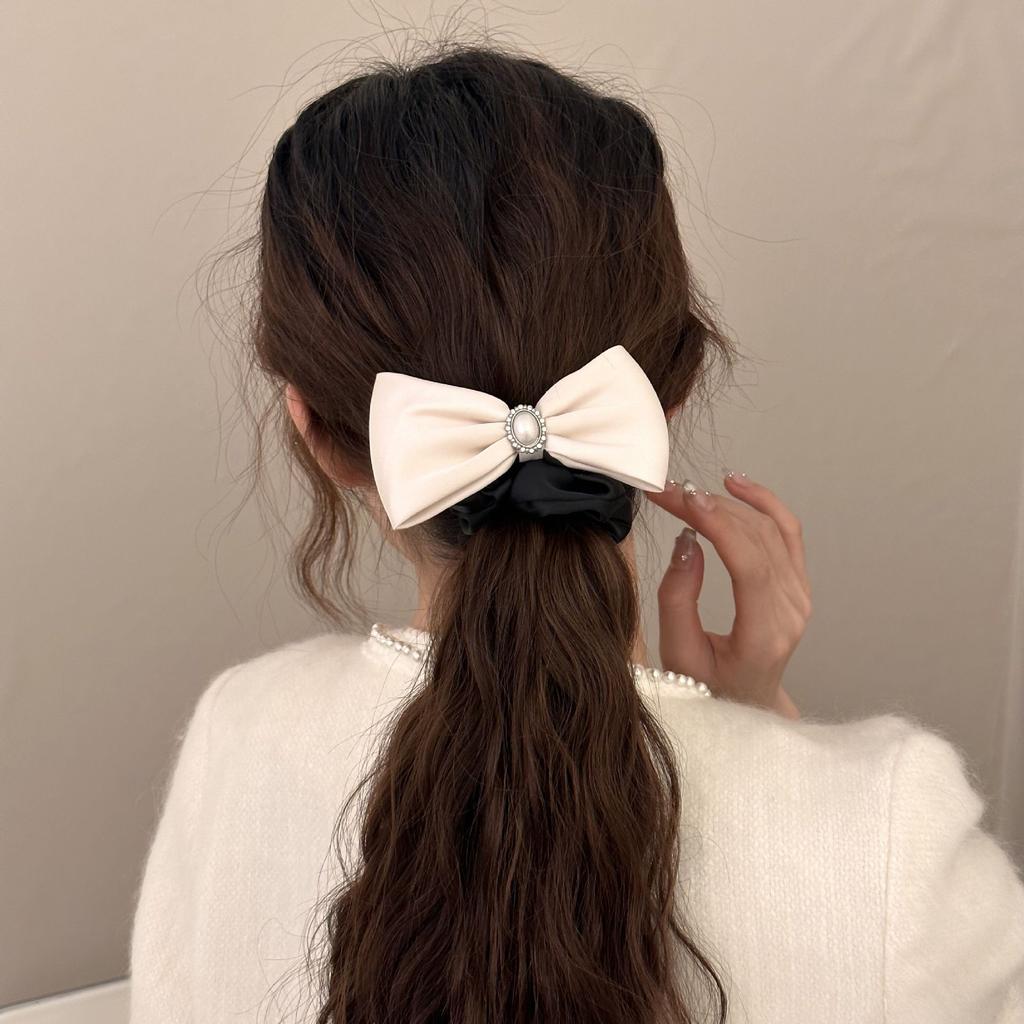 A Tall and Elegant Bow Tie, Hair Band, Headwear, High Elastic Hair Tie, and A Hair Tie At The Back of The Head