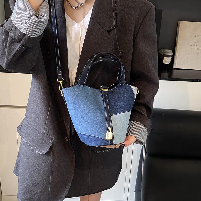 Niche design new Korean version splicing contrasting color shoulder messenger denim bag versatile casual vegetable basket bucket bag