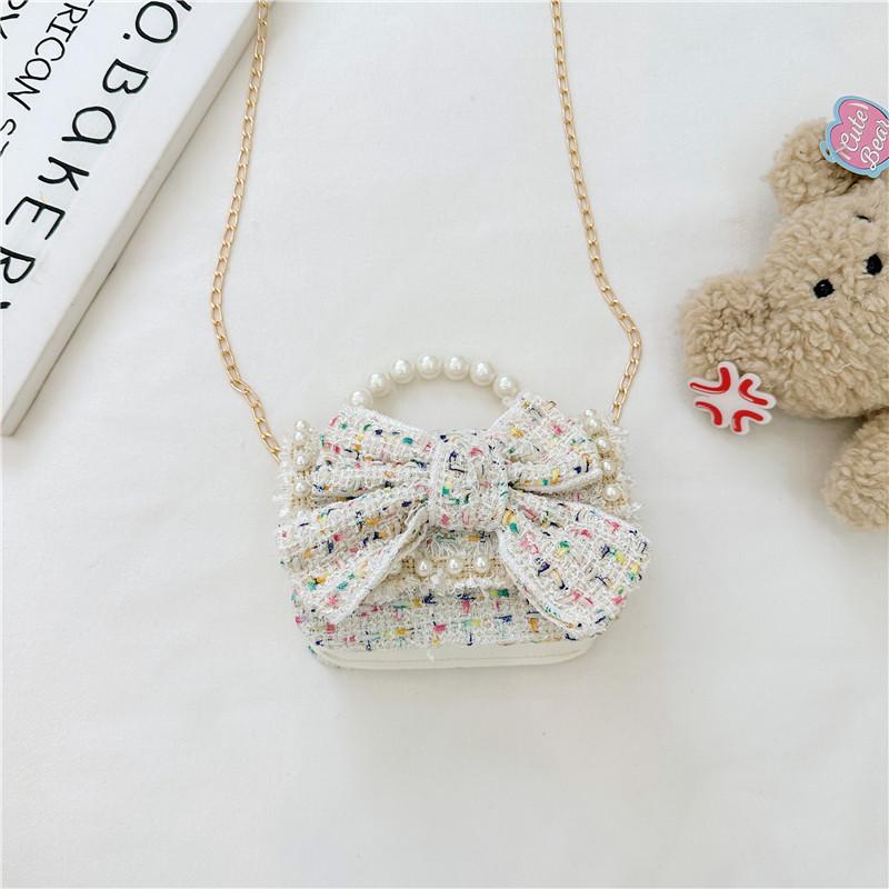 Trendy Red Mini Chain Crossbody Bag For Kids With Charming Bow Design And Lightweight Canvas Material