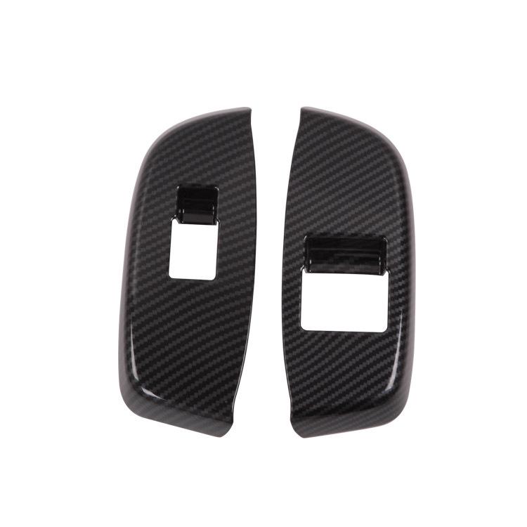 2018 NV200 Vnitřní dekorativní díly: Loketní opěrka, Výdech vzduchu, Nastavení světlometů, Rám řadicí páky, Držák nápojů