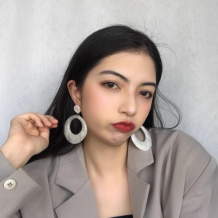 Hong Kong Style White Resin Circle Earrings with Hollow Design
