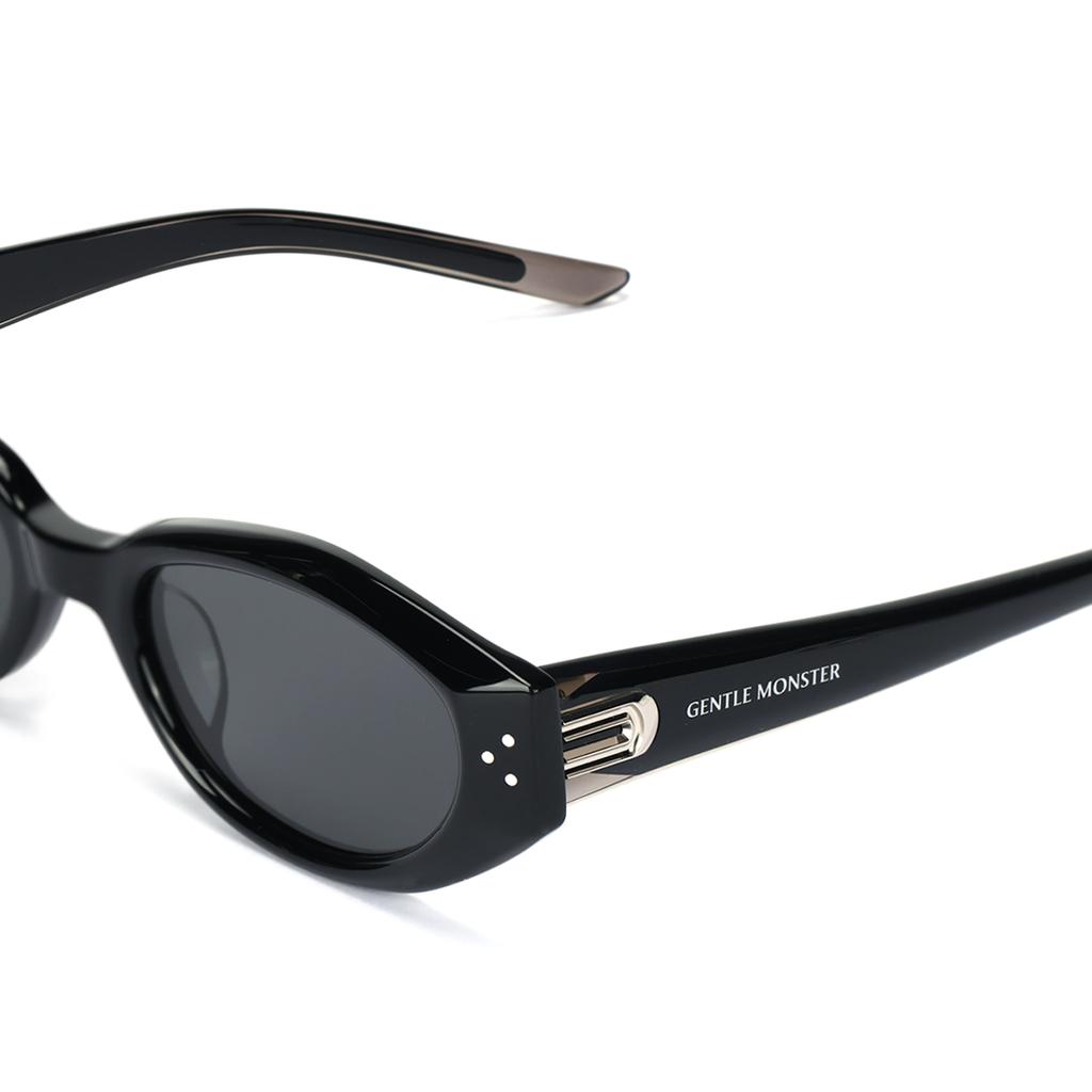Gentle Monster Occhiali da sole Cat Eye con lettere Occhiali da sole unisex Nero DADA-01