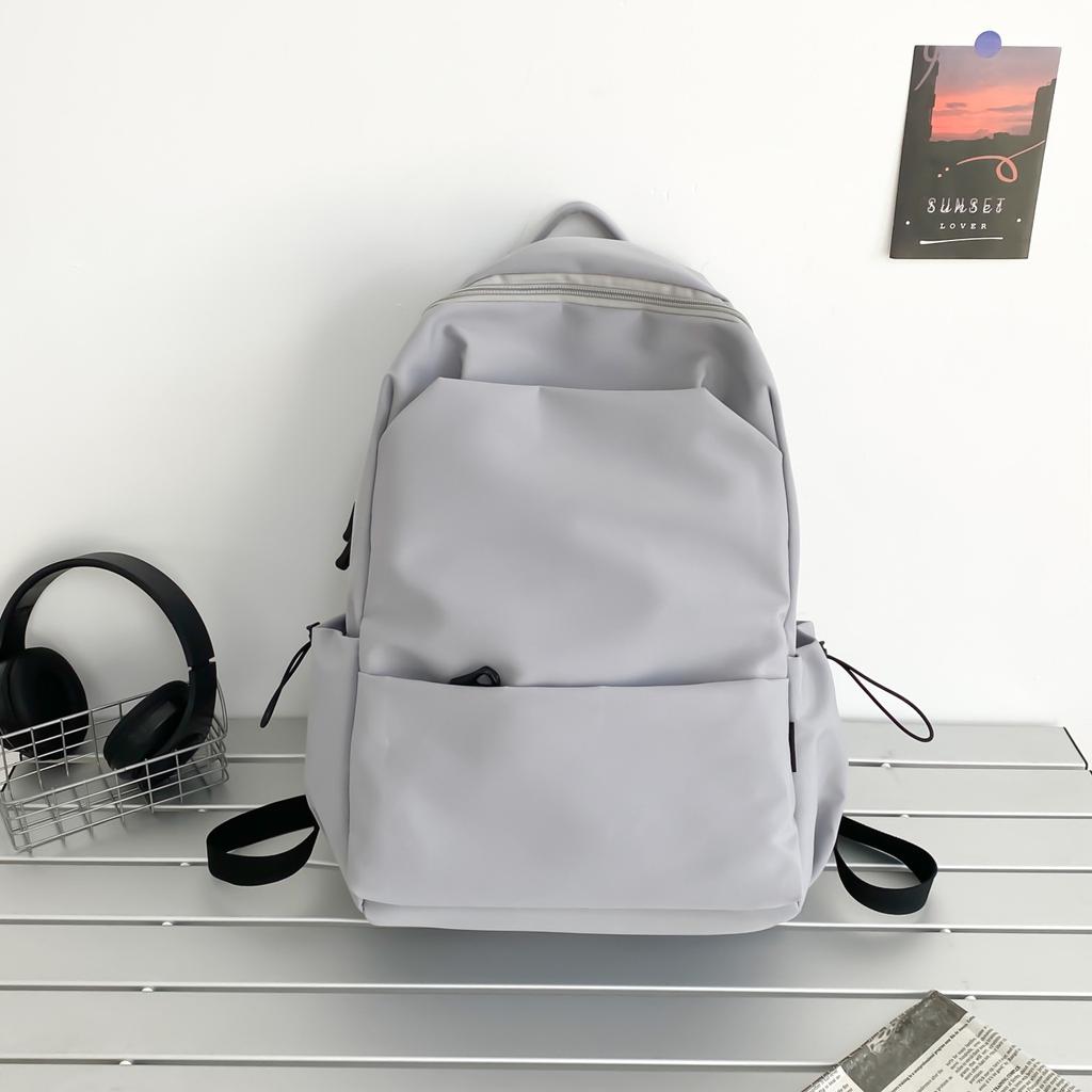 Schoolbag large capacity solid color backpack female Korean version simple versatile schoolbag male junior high school backpack female