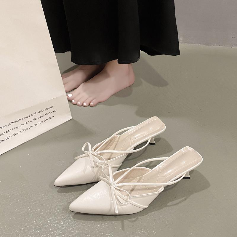 Spring and summer 2025 new French bow pointed kitten and bag head cool slippers low heel rear empty cool slippers