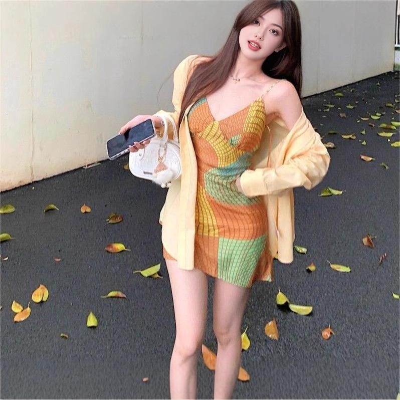 Pure desire retro vacation style suspender skirt children's summer new V-neck irregular cycle contrasting color printing dress