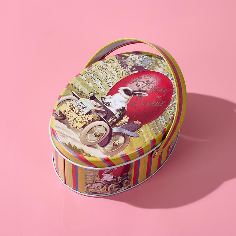 Oval Whimsical Easter Handheld Iron Box With Cheerful Rabbit And Egg Pattern Ideal For Childrens Gifts
