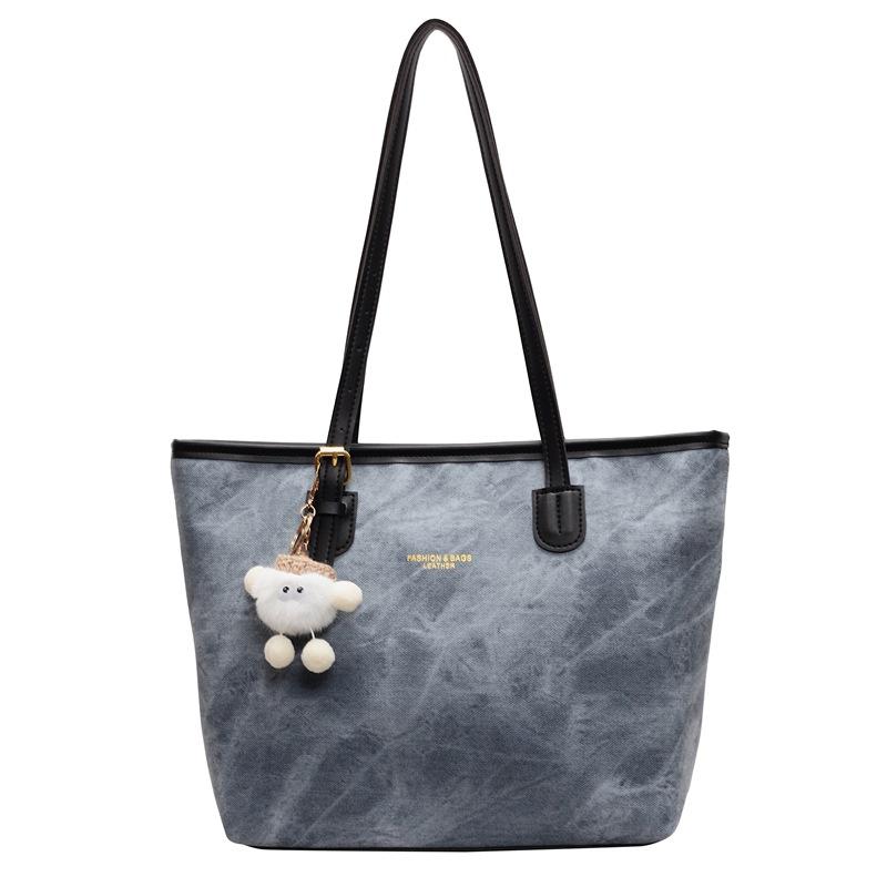 Niche high-end design tote bag large-capacity commuting leisure texture shoulder messenger bag pendant bag