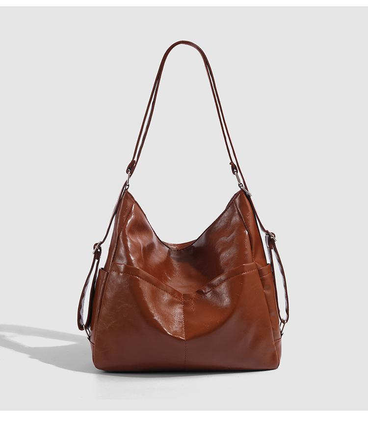 

2025 new double shoulder cross-body bag women s dual-purpose commuter bag retro soft leather class tote bag single shoulder cross-body bag коричневый