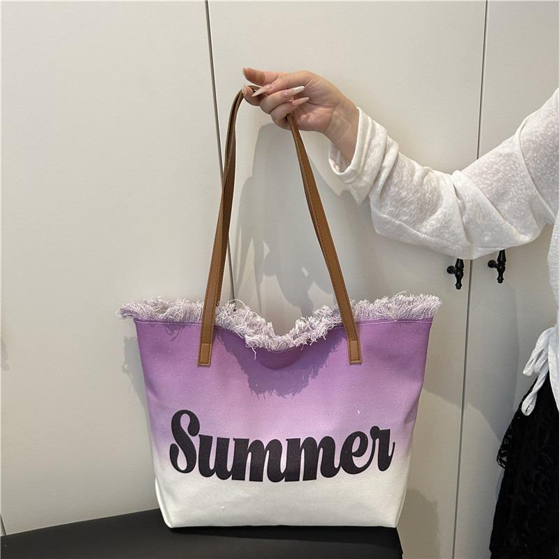 New large-capacity fringed bag beach bag women's shoulder tote bag is now popular casual bag popular women