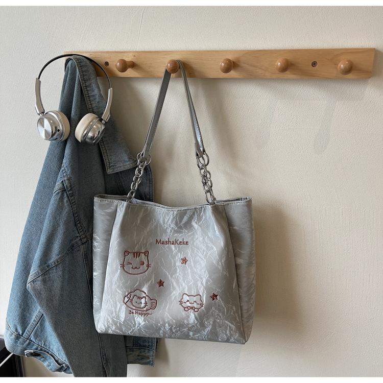 

Women s bag 2025 new large-capacity casual daily simple underarm bag contrasting color splicing elegant trendy shoulder tote bag серебряный