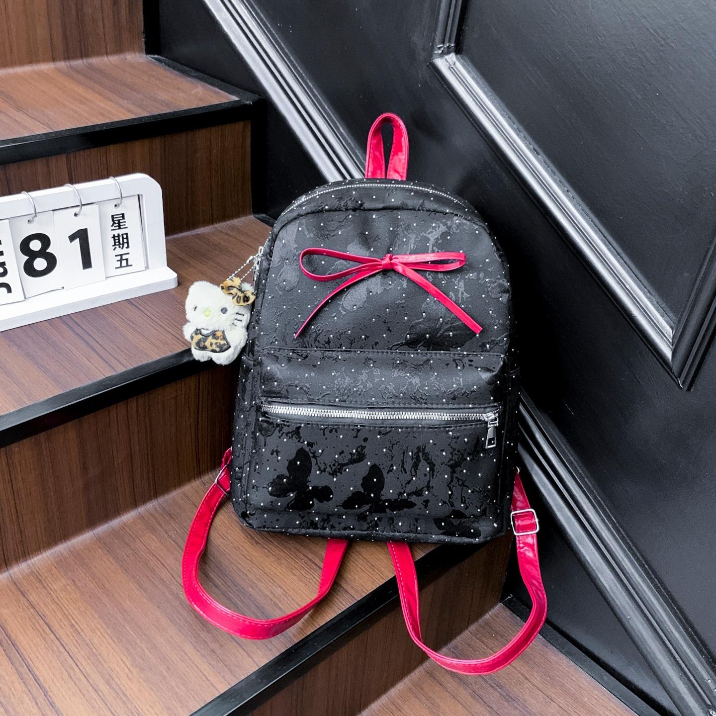 

Bow polka dot backpack for women 2025 new fashion and versatile student school bag light travel backpack for women No pendant