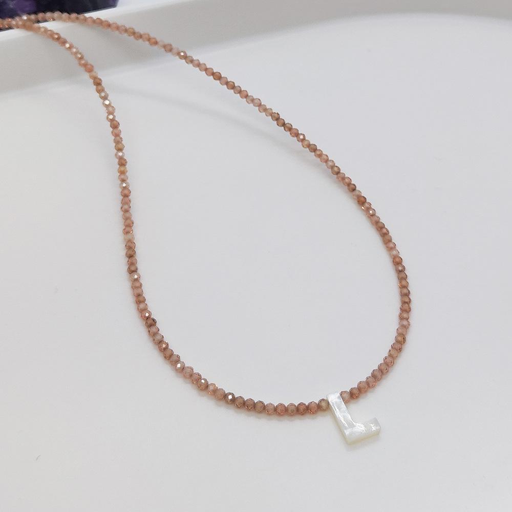 Elegant 2m Zircon Beaded Clavicle Chain: 26-Letter Deep Sea Shell Necklace for Women.