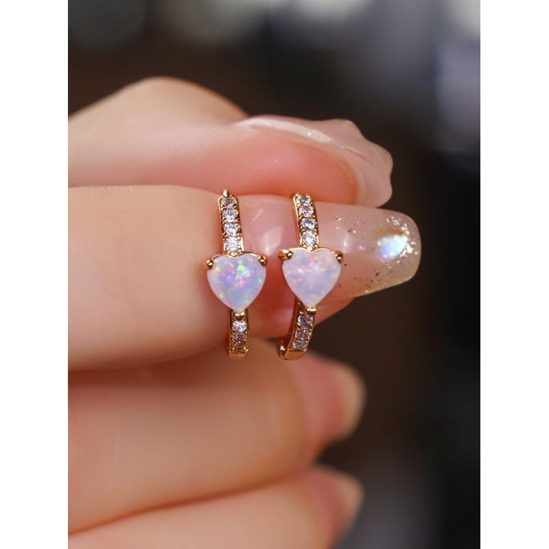 

Wis three-claw opal edged with white diamonds, blue and white opal earrings.