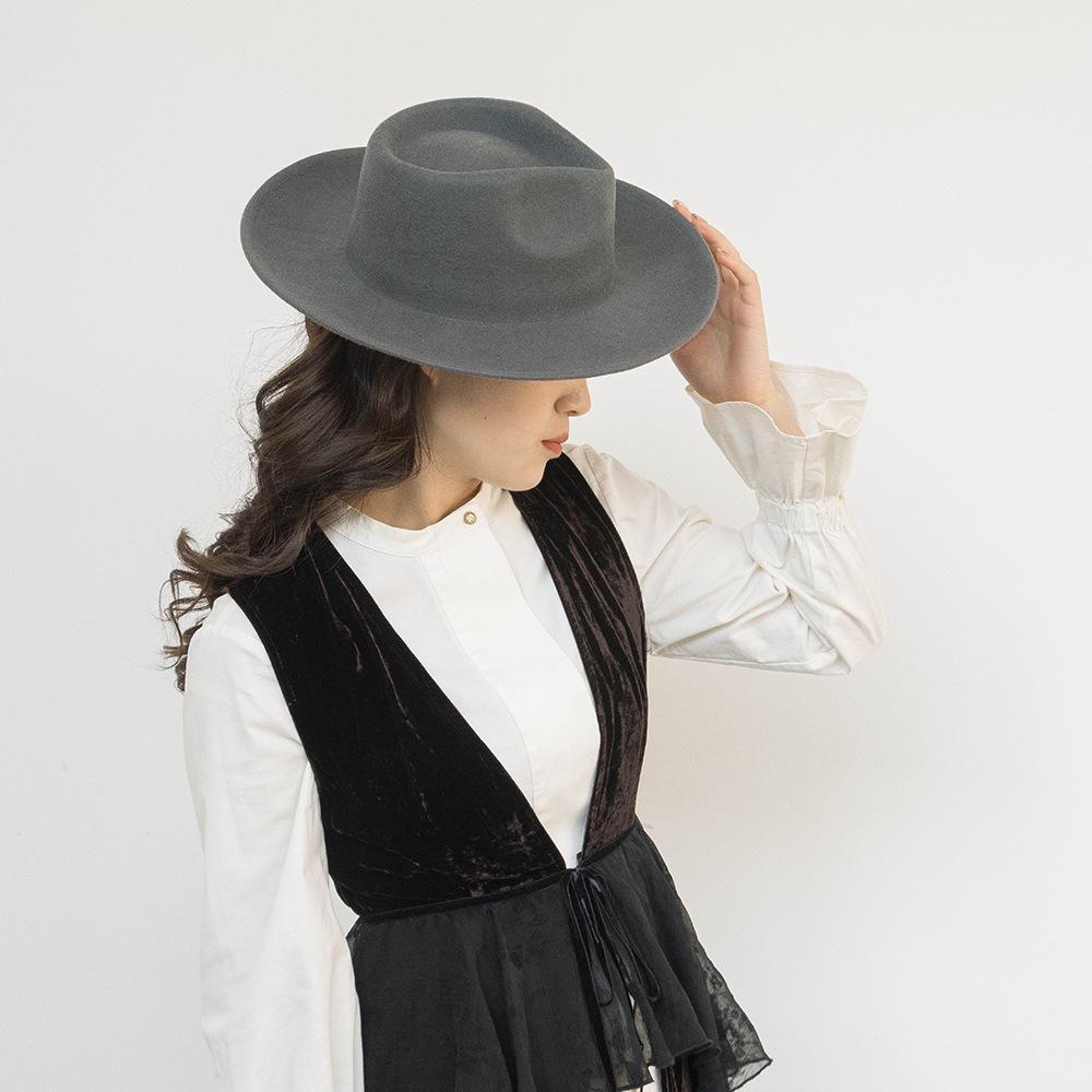 Europe, America autumn and winter new fashion simple wool felt wide brim jazz hat women's casual concave thermal top hat tide