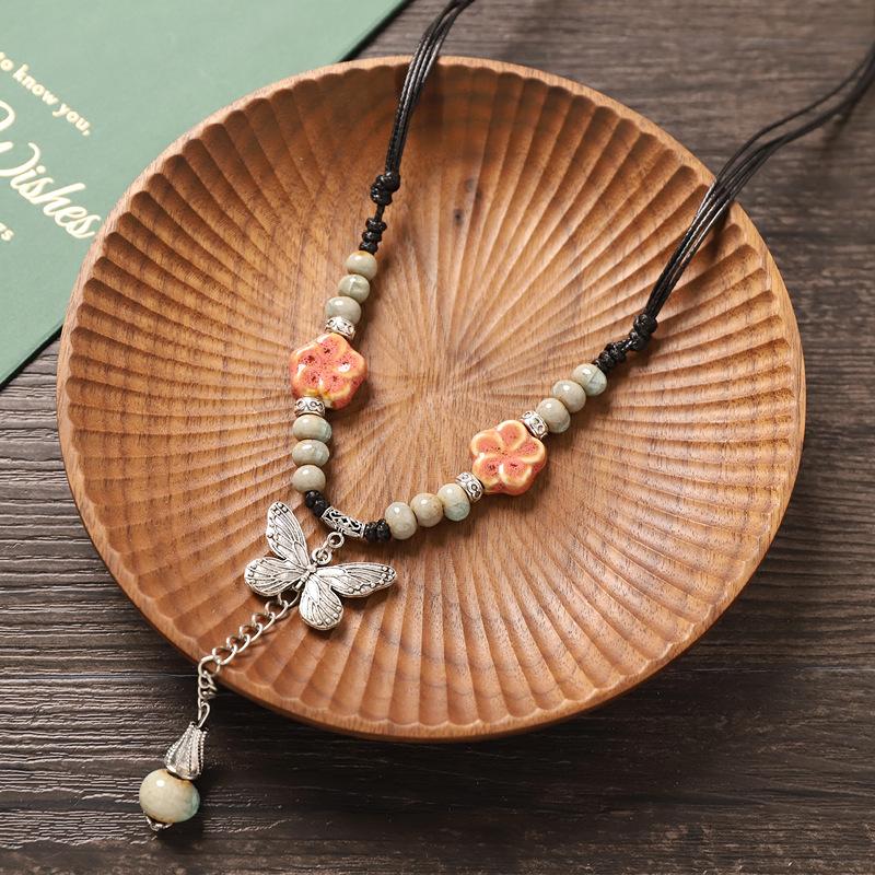 

Literary retro ceramic butterfly necklace women s high-end pendant niche simple accessories