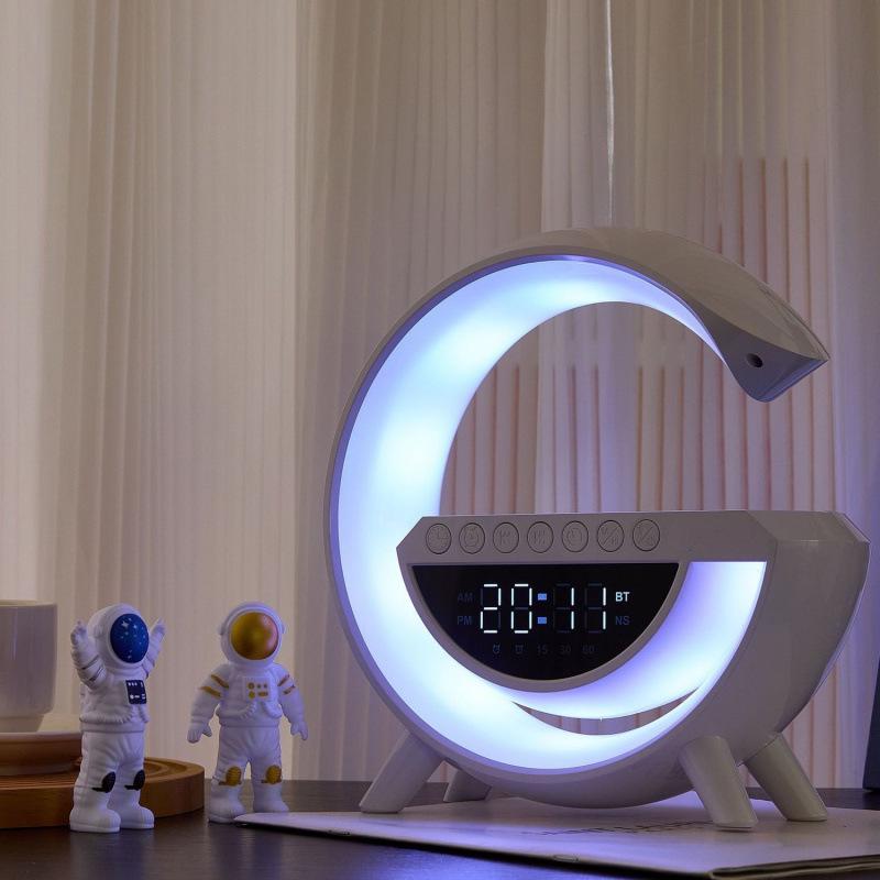 Multi-Functional Wireless Charging Bluetooth Speaker, Alarm Clock, and Night Light