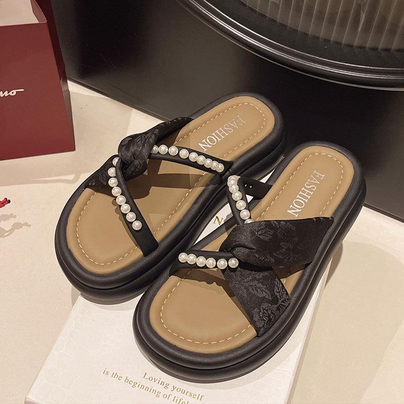 Thick bottom height increase outer wear one-word slippers female 2025 summer new fairy wind French beach pearl cool slippers