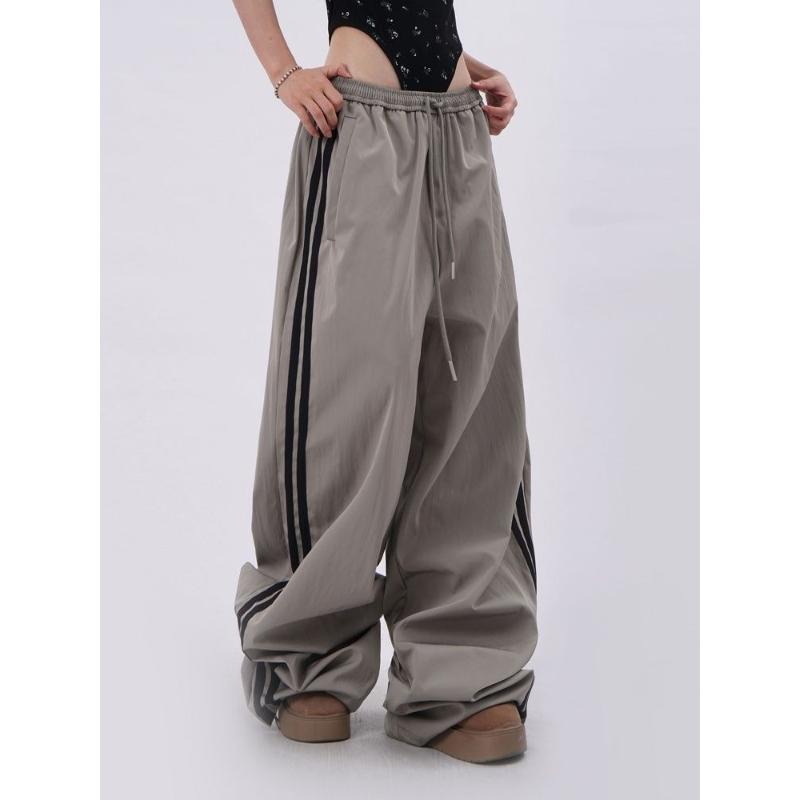 Pantaloni larghi Hip Hop oversize Moda Donna Tasca a righe Vita alta elasticizzata Pantaloni cargo Streetwear Pantaloni della tuta Larghi Nuovi Pantaloni