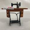 Vintage Miniature Sewing Machine with Cloth for 1/12 Scale Dollhouse Decoration.