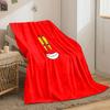 A cartoonish smiling face with big yellow eyes on a red background. for all seasons blanket lunch break throw gift